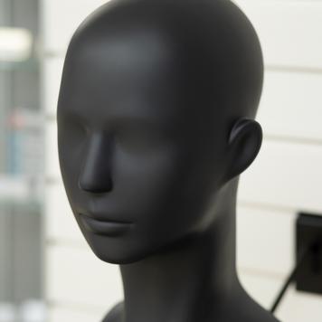 Ekspozytor w kształcie głowy manekina  „Greyhead“